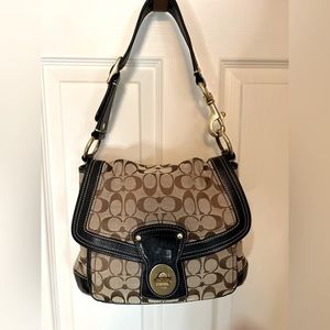 Coach signature bag with brown leather detail and adjustable strap